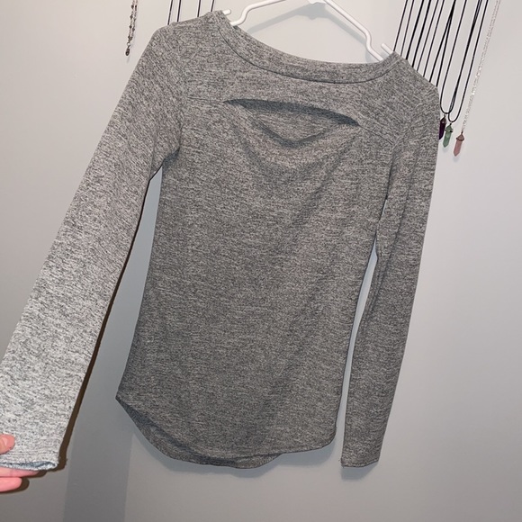 grey long sleeve top with slit, cut-out detail above breast - Picture 2 of 3
